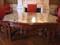 Hand carved Circassian walnut table with marble top